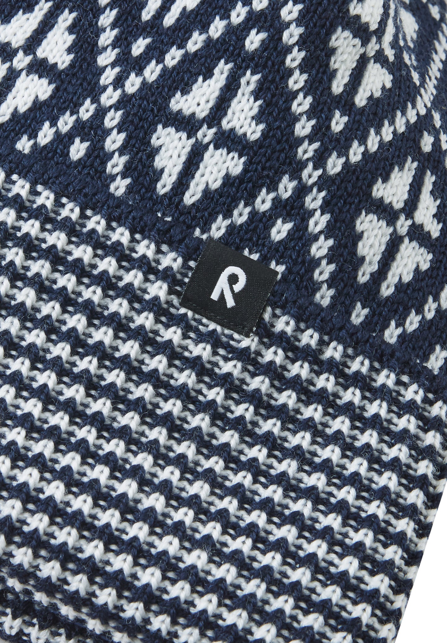 Reima Mütze <br>Kuurassa <br>Gr. 48 bis 58 <br>innen hautfreundliches Fleece<br> aussen warme, wasserabweisende Merino-Wolle<br>Windstopper-Membrane im Ohrbereich