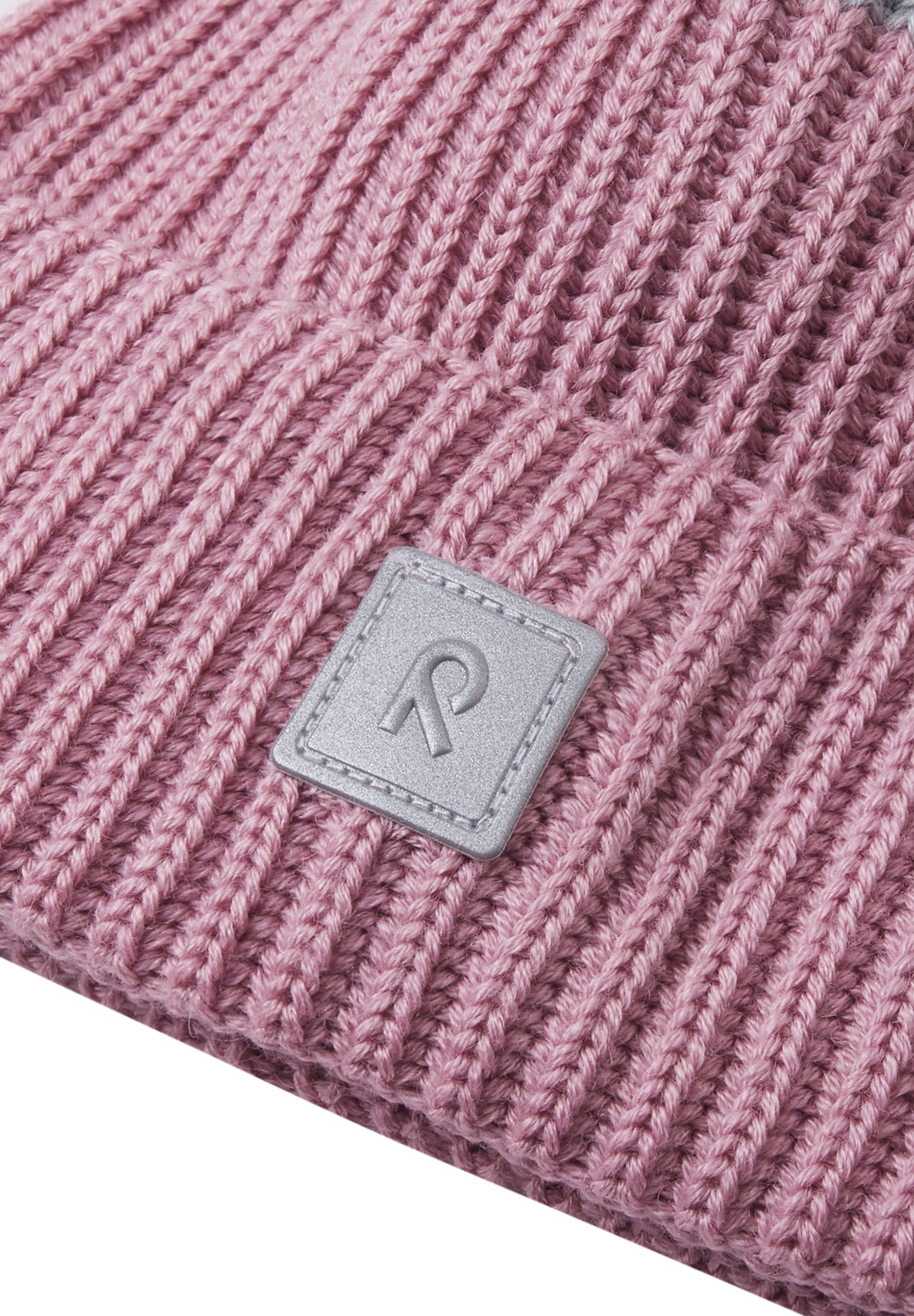 Reima Mütze<br>Pilke <br>Gr. 48 bis 58 <br>eingenähtes reflektierendes Garn <br>innen hautfreundliches Fleece<br> aussen warmer, wasserabweisender Woll-Mix<br> Windstopper-Membrane im Ohrbereich