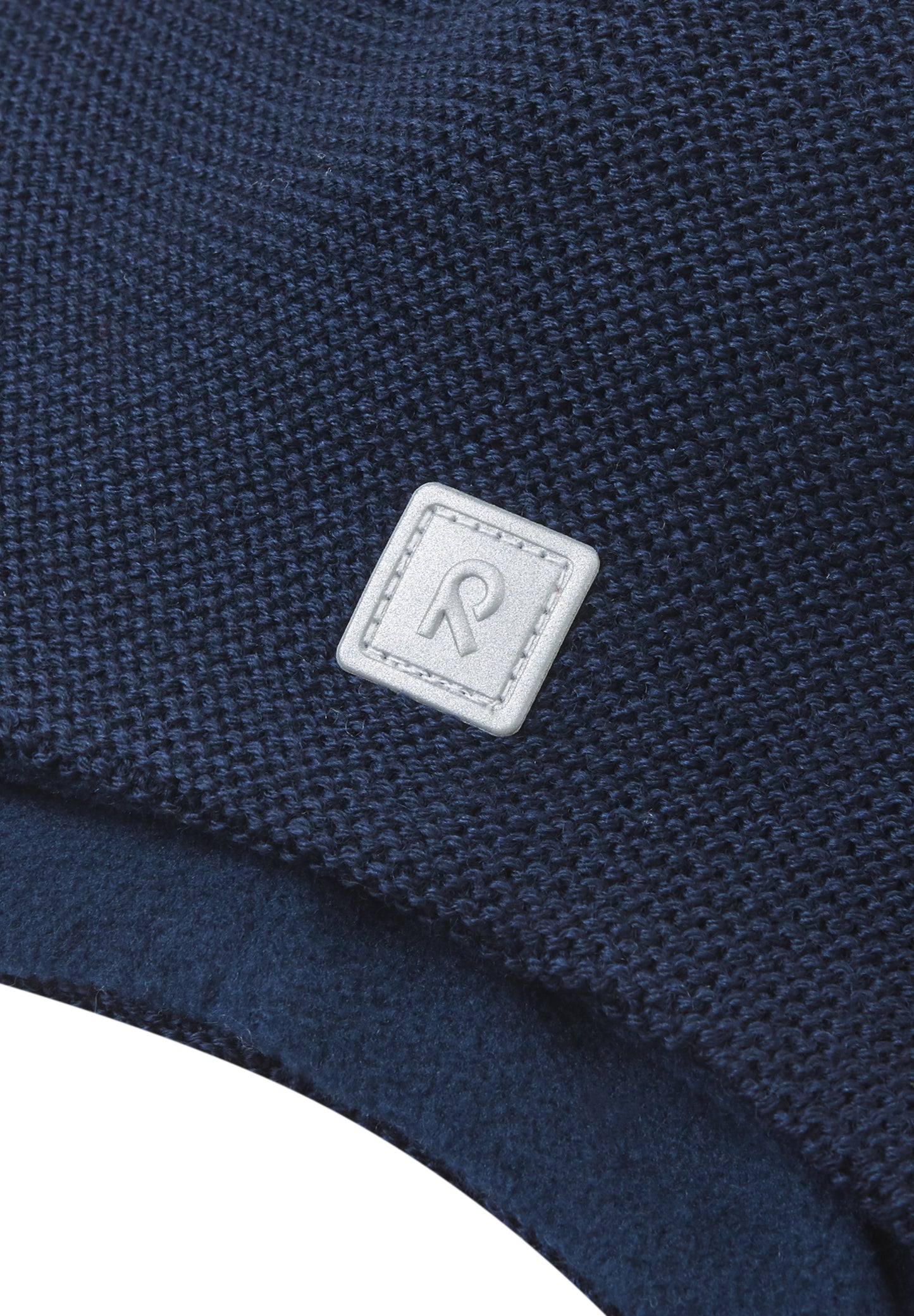 Reima Mütze mit Bändel <br>Piponen <br>Gr. 46 bis 54 <br>innen hautfreundliches Fleece<br> aussen warme, wasserabweisende Merino-Wolle<br>Windstopper-Membrane im Ohrbereich