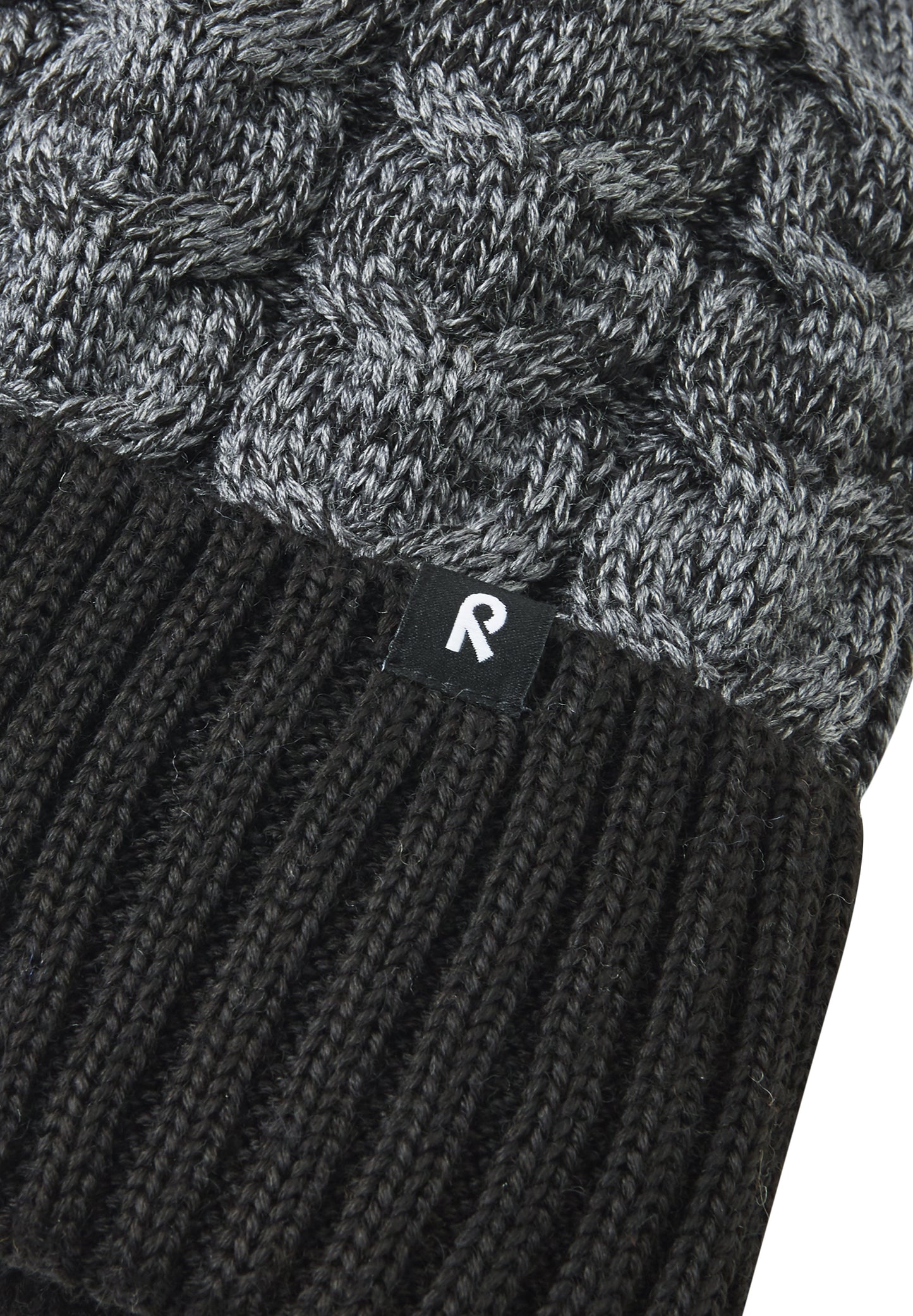Reima Mütze<br>Routii <br>Gr. 52 bis 58 <br>innen hautfreundliches Fleece<br> aussen warmer, wasserabweisender Woll-Mix<br> Windstopper-Membrane im Ohrbereich