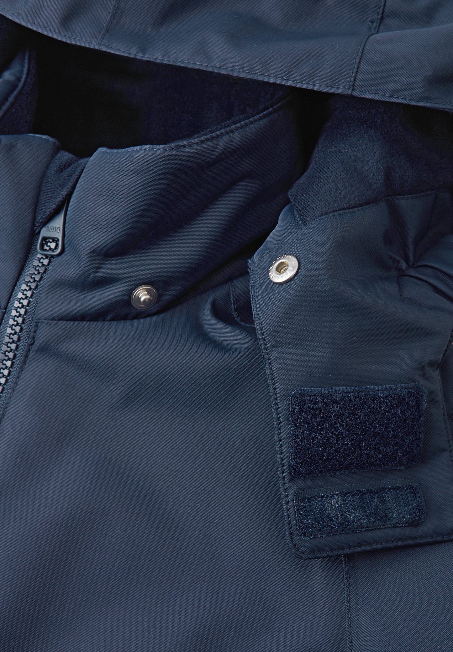 REIMA TEC+ Winteroverall/Skianzug <br>Kauhava <br>Gr. 104 bis 140 <br>extra robuster Po- und Knie/Schienbeinbereich <br>abnehmbare Fuss-Schlaufen<br> WS 10'000 mm