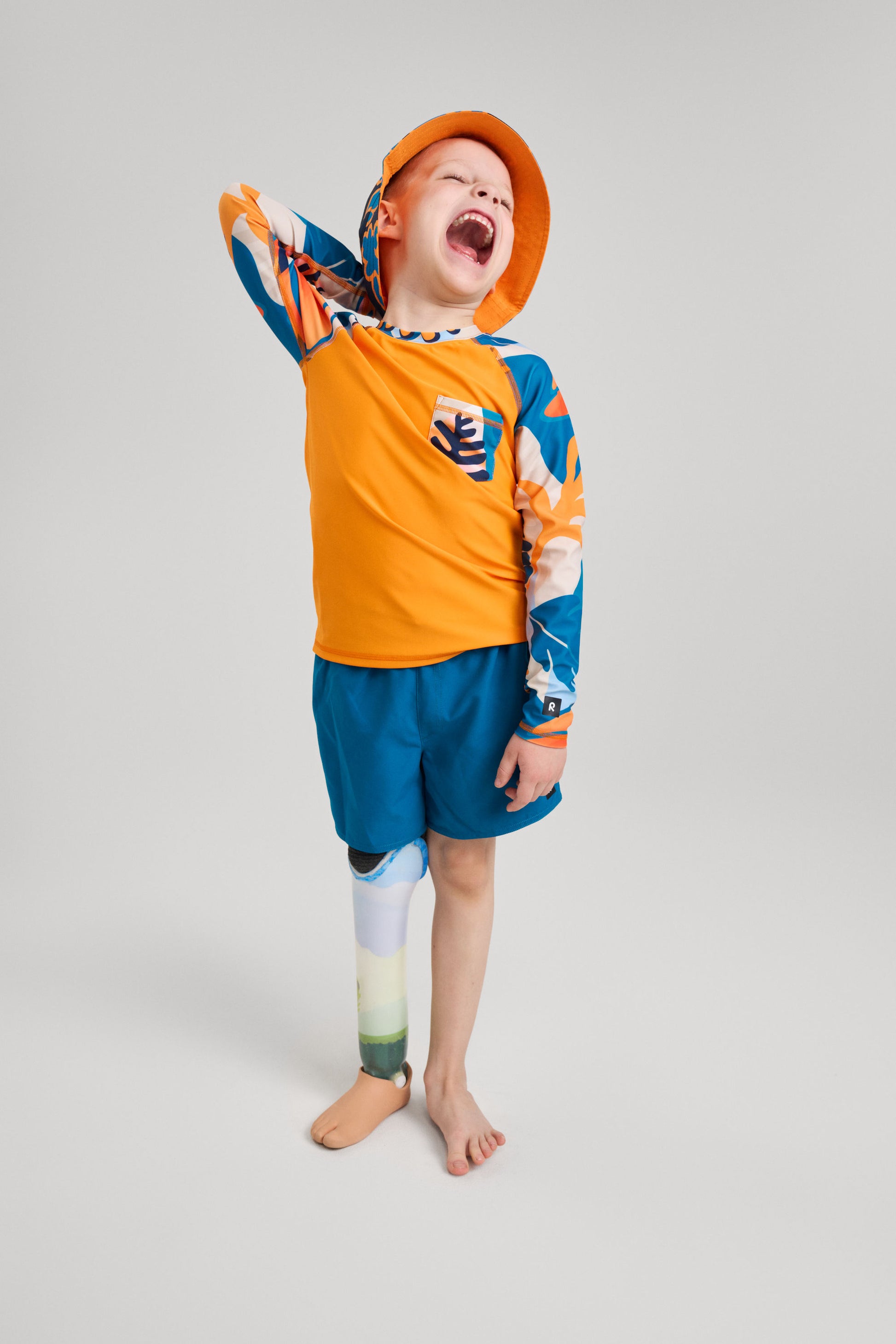 REIMA Kinder UV-Shirt / Badeshirt Kroolaus orange/blau 5200150A 27A0