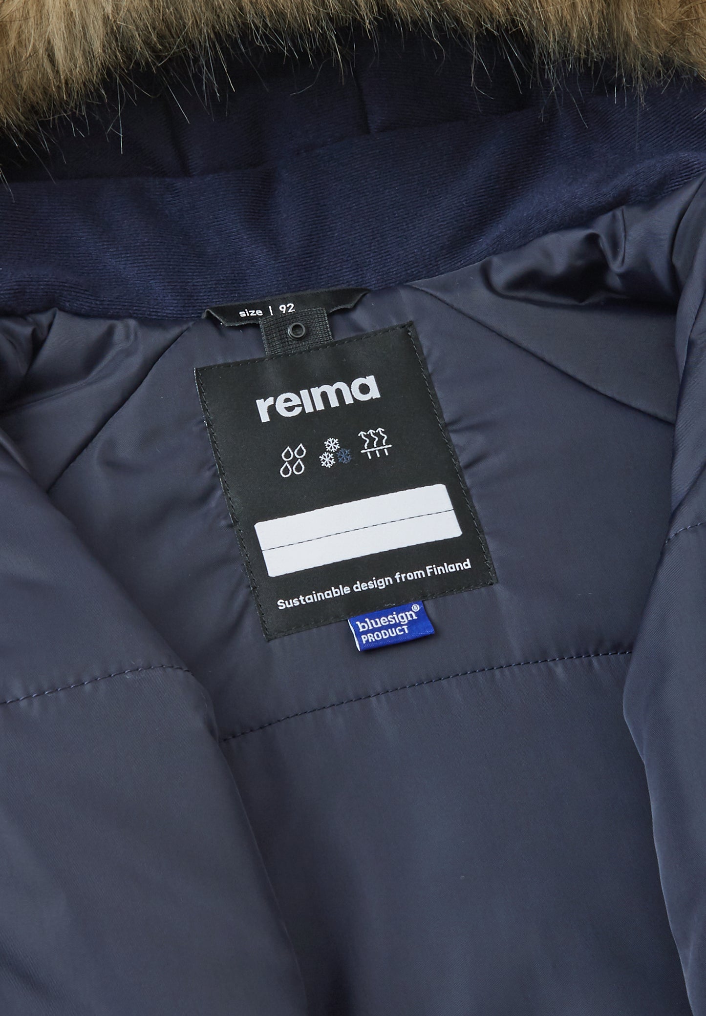 REIMA TEC Winteroverall/Skianzug <br>Lappi <br>Gr. 92<br> Po-Bereich extra dick isoliert<br> Taille regulierbar<br> Kunst-Pelz abnehmbar<br> abnehmbare Fuss-Schlaufen<br> WS 12'000 mm