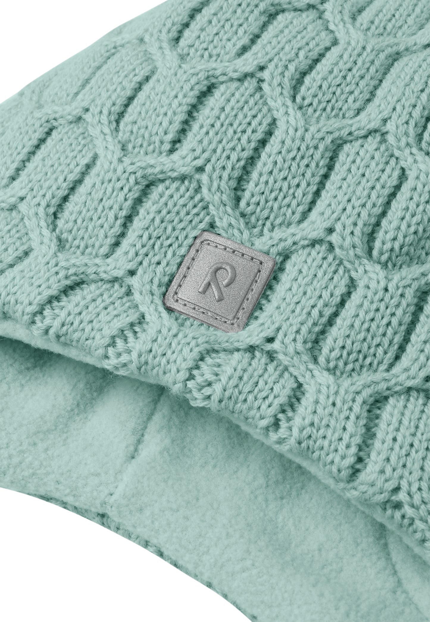 REIMA Mütze mit Bändel <br>Nunavut <br>Gr. 48 - 52 <br>innen hautfreundliches Fleece<br> aussen warme, wasserabweisende Merino-Wolle<br> Windstopper-Membrane im Ohrbereich