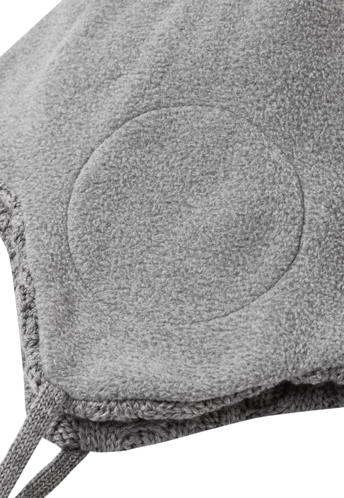 REIMA Mütze mit Bändel <br>Nunavut <br>Gr. 46, 48, 52 <br>innen hautfreundliches Fleece<br> aussen warme, wasserabweisende Merino-Wolle<br> Windstopper-Membrane im Ohrbereich