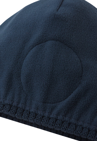 Reima Mütze<br>Pampula <br>Gr. 48/50 <br>innen hautfreundliches Fleece<br> aussen warmer, wasserabweisender Woll-Mix<br> Windstopper-Membrane im Ohrbereich