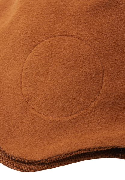 REIMA Mütze<br> Pipopaa<br>Gr. 52, 54, 56 <br>innen hautfreundliches Fleece<br> aussen warme, wasserabweisende Merino-Wolle<br>Windstopper-Membrane im Ohrbereich<br> länger geschnitten im Ohrbereich ohne Bändel