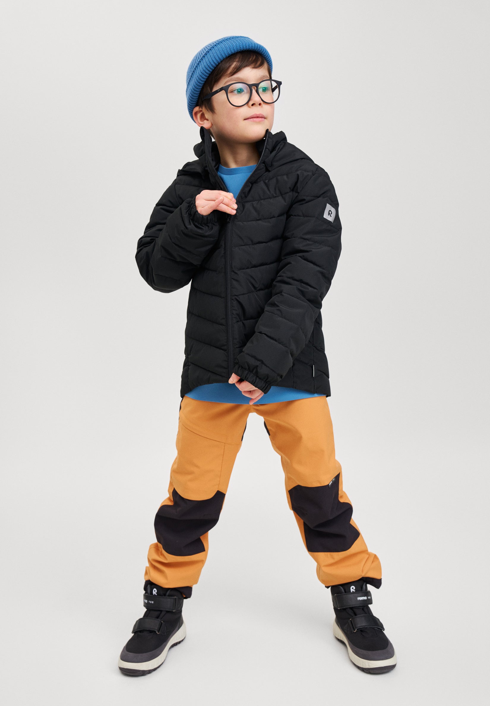REIMA dünne Daunenjacke für Kinder Uumaja schwarz 9990 5100340A
